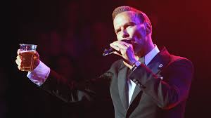 beer endorsed by a british popstar crossword​